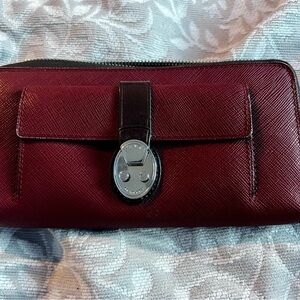 Burgundy TUMI Wallet with Silver Clasp